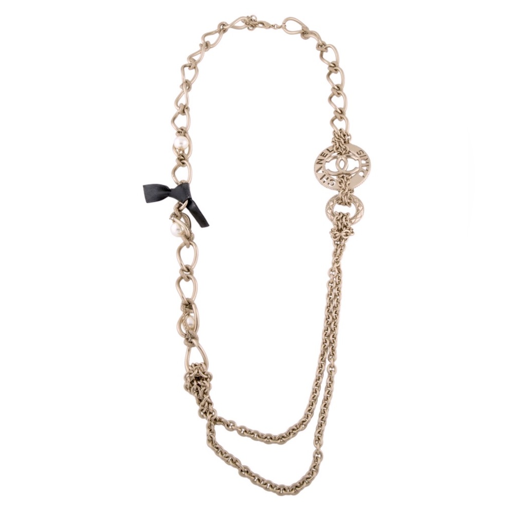 Faux Pearl and Leather Bow CC Station Necklace. $1,000